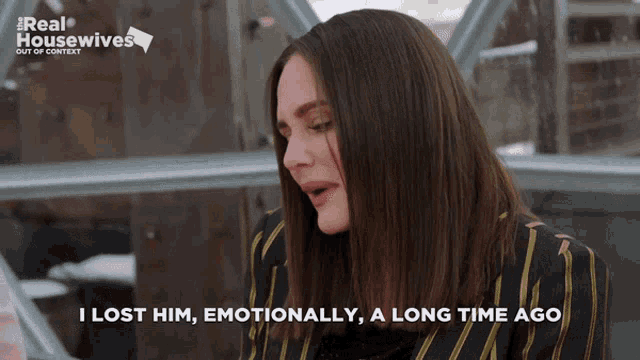 a woman says " i lost him emotionally a long time ago " while wearing a striped jacket