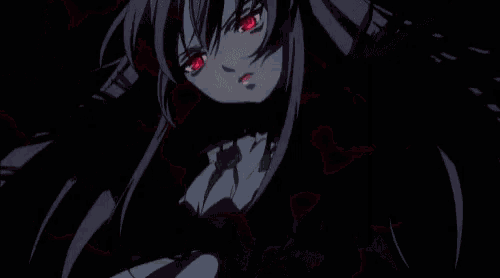 a person is standing in a dark room with a white light behind them