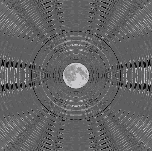 a black and white photo of a full moon in a circle