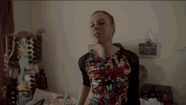 a woman is standing in front of a mirror with the words this is a fat opportunity above her