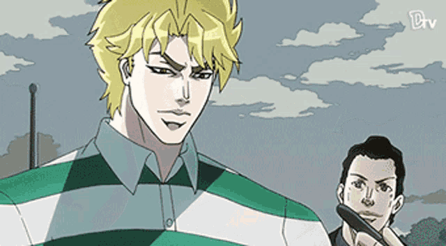 a man in a green and white striped shirt stands next to another man in a black shirt