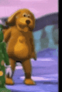 a brown teddy bear is standing next to a tree in a cartoon scene .
