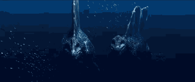 two dinosaurs are swimming in the ocean and looking at the camera