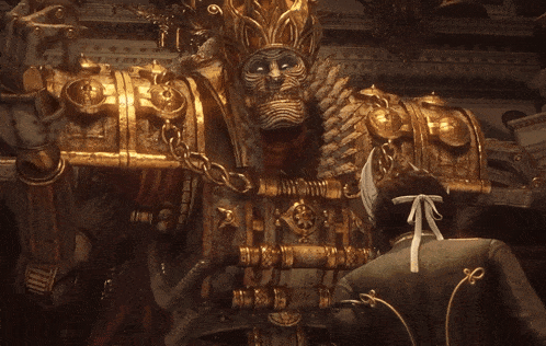 a statue of a man with a beard and a crown on his head