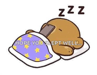 a cartoon bear is sleeping with a cell phone in its mouth .