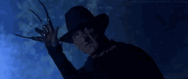a picture of freddy krueger from a nightmare on elm street shows his claws