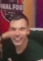 a blurry picture of a man 's face with a sign in the background that says ' full fou ' .