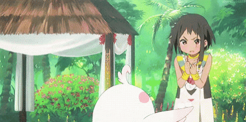a girl in a white dress is standing next to a white rabbit in front of a thatched hut .