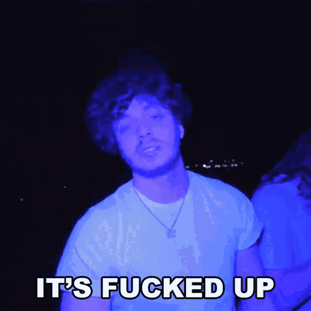 a man says it 's fucked up in a blue background