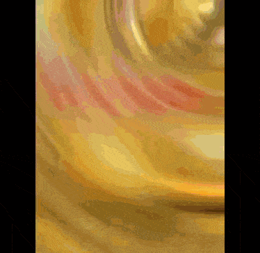 a close up of a painting with a swirl of yellow and red