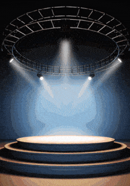 a stage with a few lights on it and a blue background