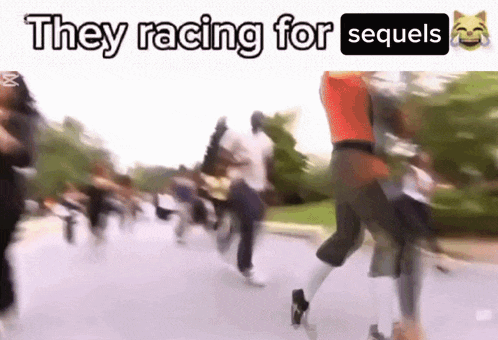 a group of people are running down a street with the words they racing for sequels above them .