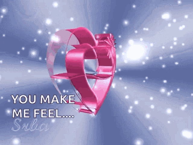 a pink heart that says you make me feel