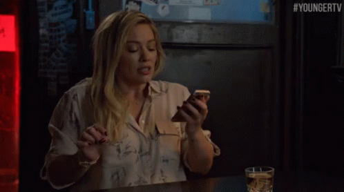 Kelsey Annoyed Phone GIF - Younger Tv Land Hilary Duff GIFs