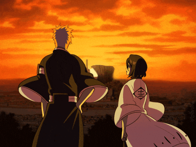 a man and a woman are standing in front of a sunset with a chinese symbol on their backs