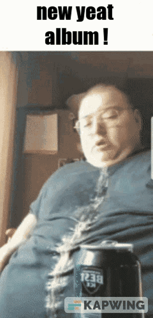 a picture of a man with the words new yeat album written above him