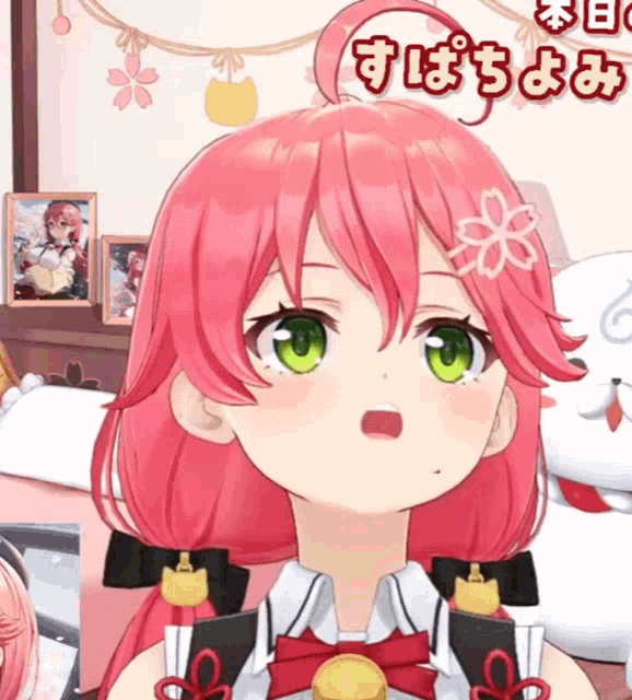 a girl with pink hair and green eyes is in a room