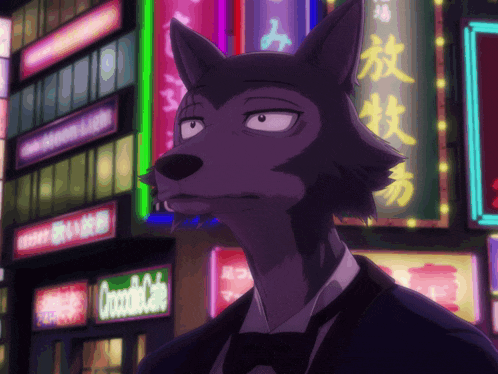 a man in a tuxedo is standing in front of a sign that says occucafe