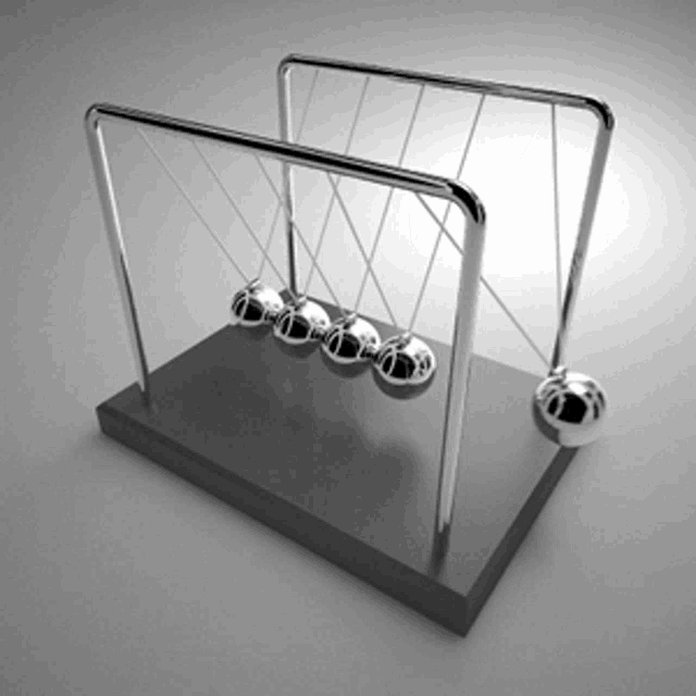a newton 's cradle with silver balls hanging from metal bars