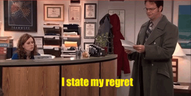 a man standing in front of a reception desk holding a piece of paper that says i state my regret on it