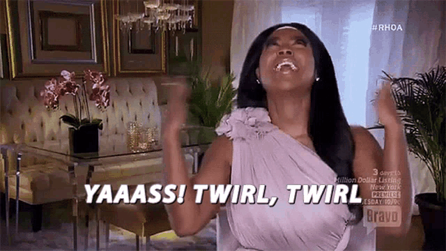 a woman in a purple dress is saying yaaass ! twirl , twirl