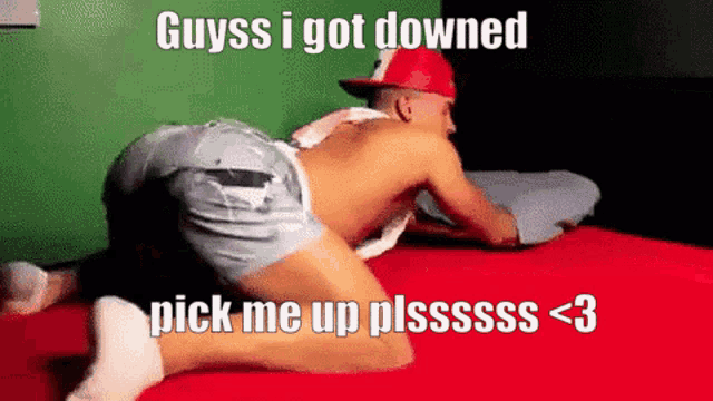 a shirtless man is kneeling on a bed with a caption that says guyss i got down