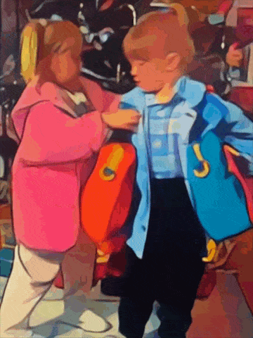 a boy and a girl are standing next to each other