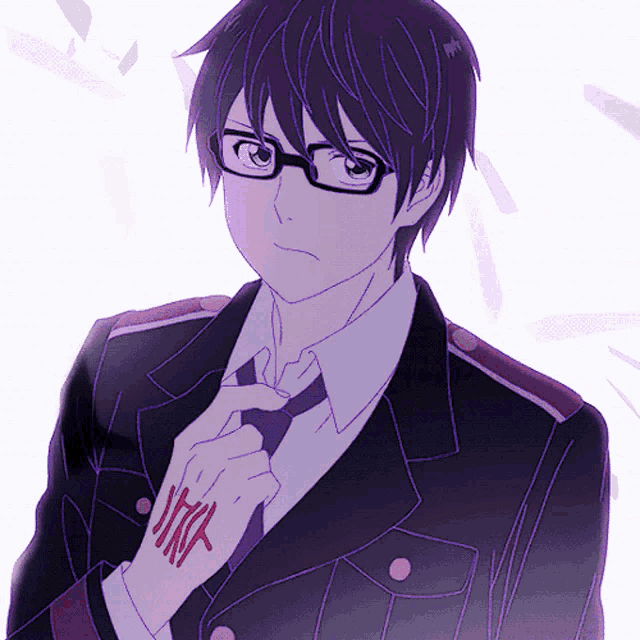 a man in a suit and tie has a tattoo on his wrist that says ' xtra '