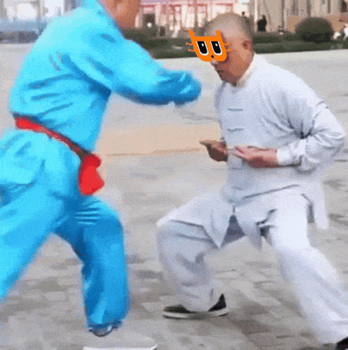 a man in a blue suit has a mask on his face