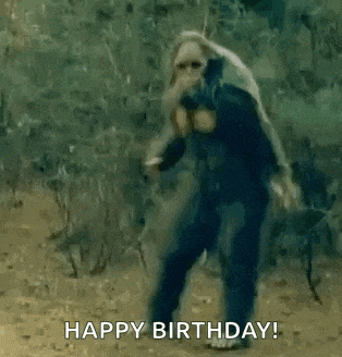 a man is dancing in the woods with the words `` happy birthday '' .