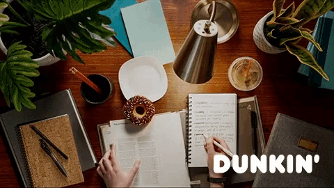 a dunkin ' logo is displayed on a desk