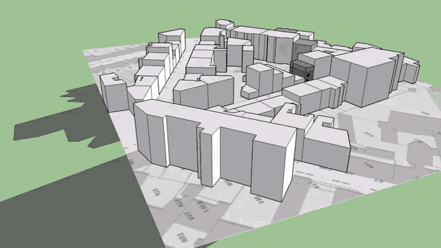 a 3d model of a city with a blue building in the center