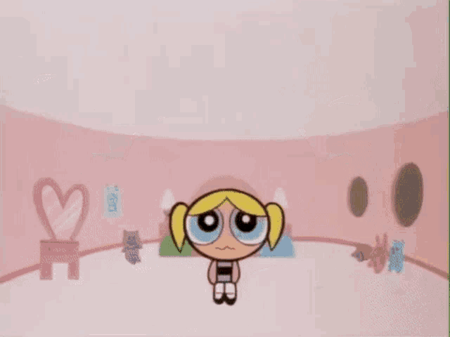 bubbles from the powerpuff girls is crying in a room with a pink background .