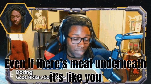 a man wearing headphones says " even if there 's meat underneath "