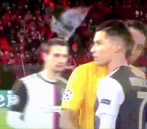 a man in a yellow shirt with the number 11 on the back