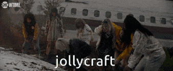 a group of people are gathered in front of an airplane that says jollycraft on it