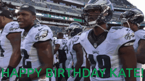 a group of football players standing in a line with the words happy birthday kate written in green