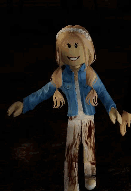 a girl in a blue shirt and bloody pants is standing in the dark with her arms outstretched .