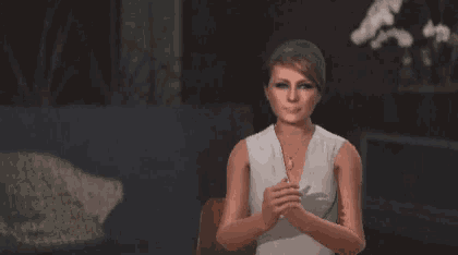 a computer generated image of a woman in a white dress