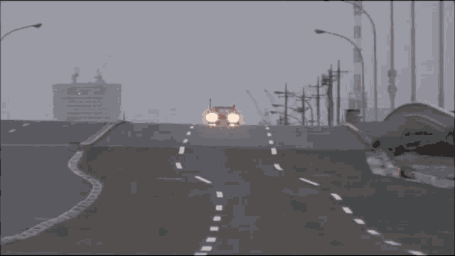 a car driving down a highway with a red light on the side