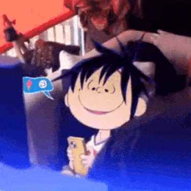 a cartoon character is smiling and holding a phone