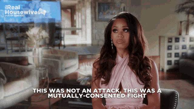 a woman in a pink dress says this was not an attack this was a mutually-consented fight