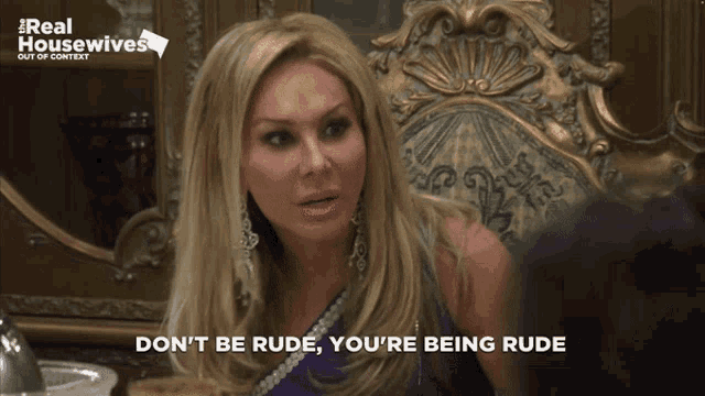 a woman says " do n't be rude you 're being rude " in front of a chair