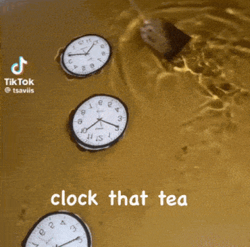 a clock that says clock that tea is in a bucket of water