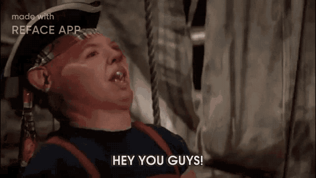 a man in a pirate hat is saying " hey you guys "