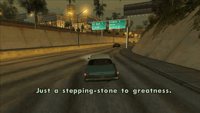 a car driving down a highway with a sign that says east beach