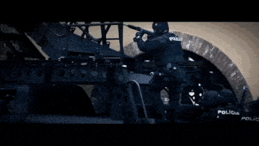 the word policia that is on a vehicle
