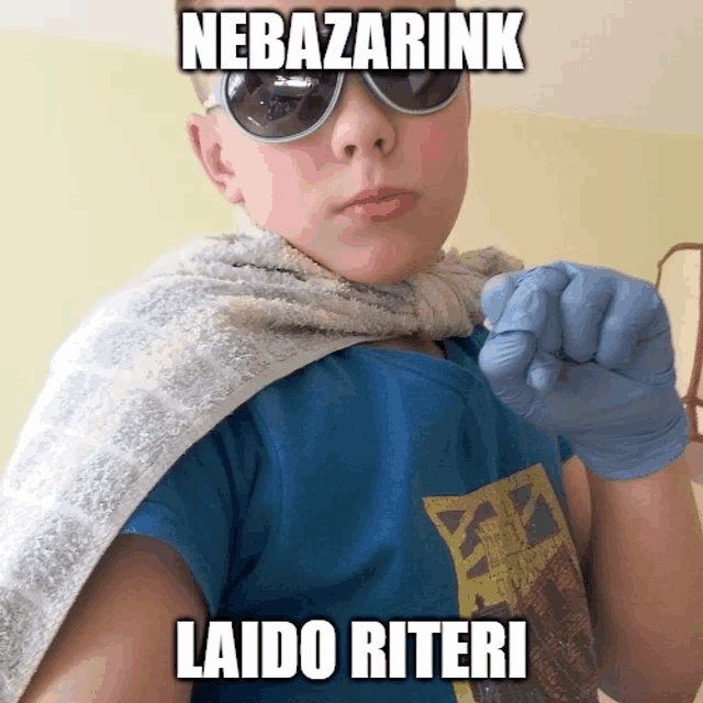 a boy wearing sunglasses and a cape with the words nebazarink laido riteri on the bottom