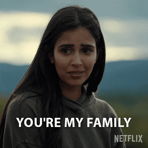 a woman in a hoodie says you 're my family on netflix