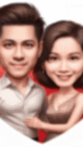 a man and a woman are standing next to each other in front of a heart shaped background .